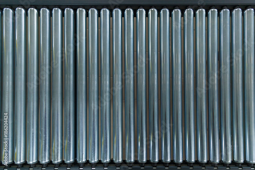 Crossing of the roller conveyor. Crossing of the roller conveyor, Production line conveyor roller transportation objects.