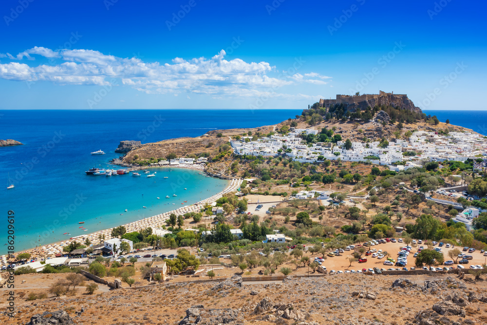 View of village, bay and Acropolis of Lindos (Rhodes, Greece)