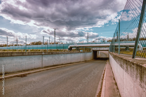 Bridge for train on the road. natural gas pipeline over the road. Motorway in Austria.