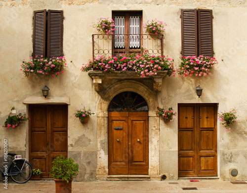 Facade of old house in Pienza