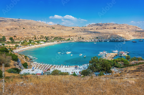 View of sandy beach in Bay of Lindos (Rhodes, Greece)