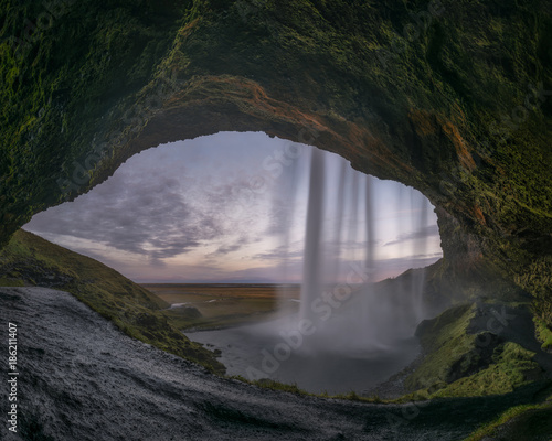 Panorama from behind Seljalandsfoss in Iceland 