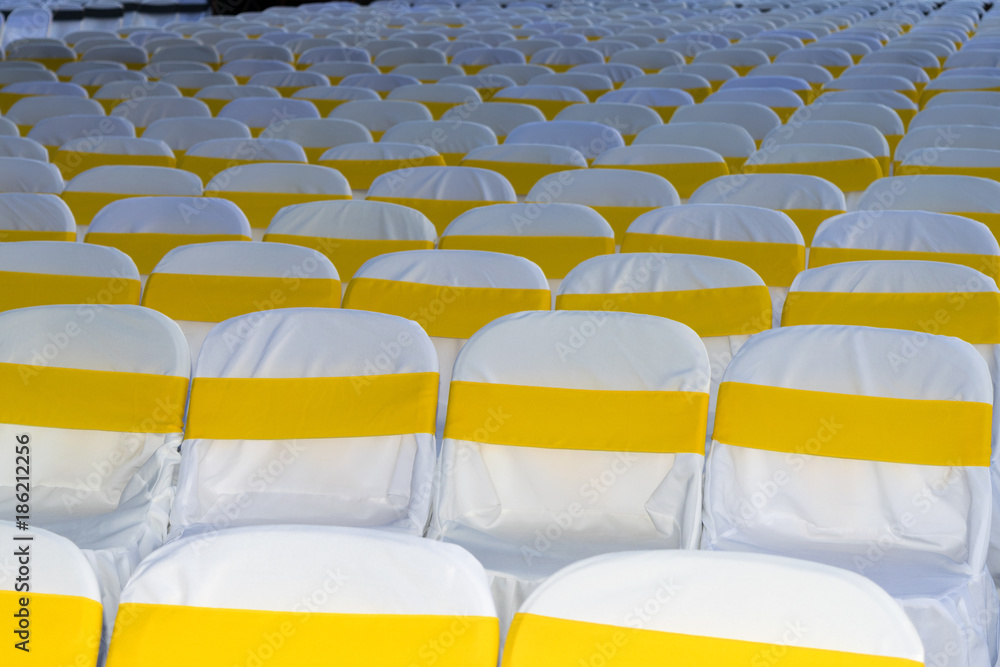 Fototapeta premium beautiful white chairs decorated with bows