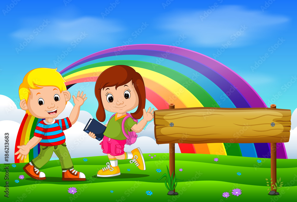 cute girl and boy in the park on rainbow day