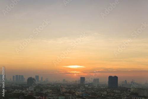 background of sun rise in the city at morning time © designbydx