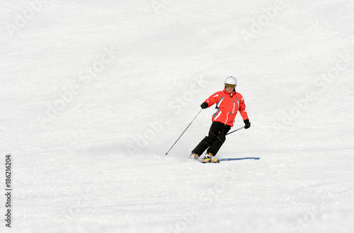 Skier on the mountain slope in Dolomites, Italy, Europe.