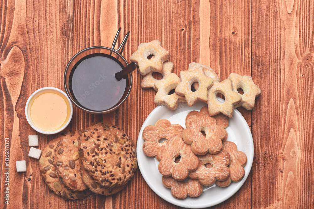 Hot beverage and pastry concept. Glass of black tea Hot beverage and pastry concept. Glass of black tea