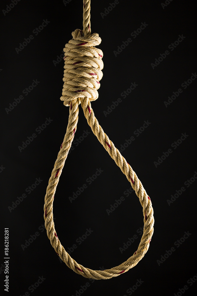 Brown rope noose dark and light on black background, concept of