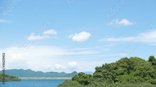 Mountains, blue sky and lake in Hong Kong © Andy