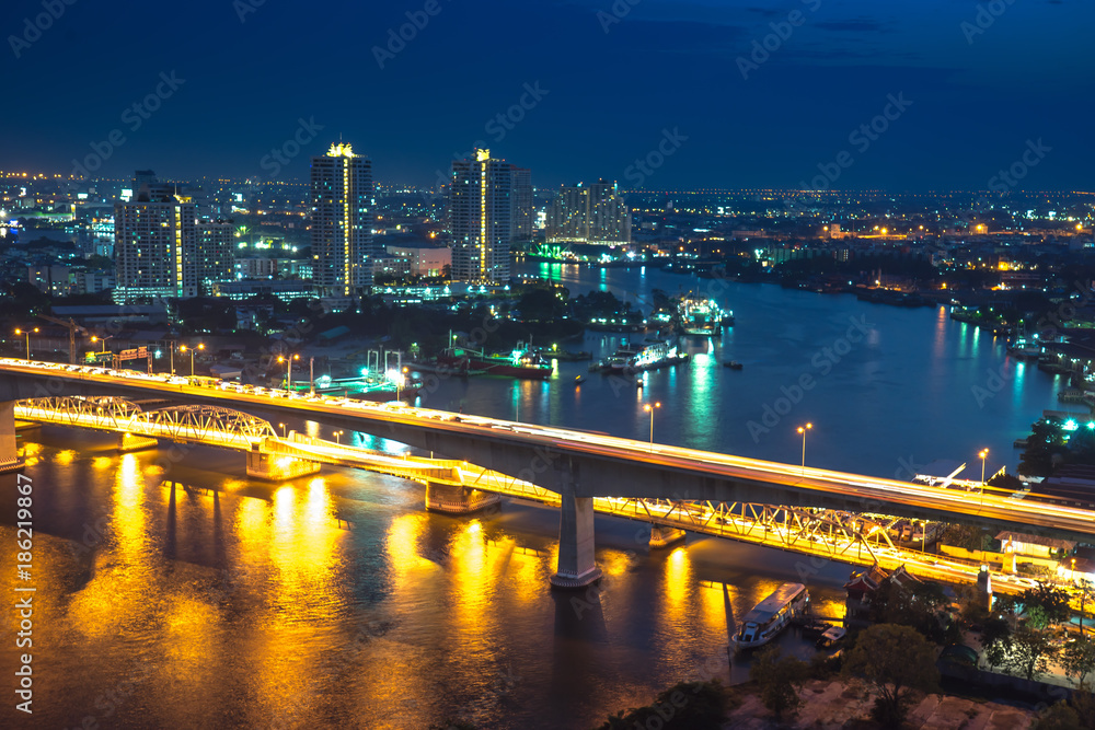Bangkok river side cityscape. Bangkok night view in the business district. at twilight.Panorama view of Bangkok city scape at night time. vintage colour tone