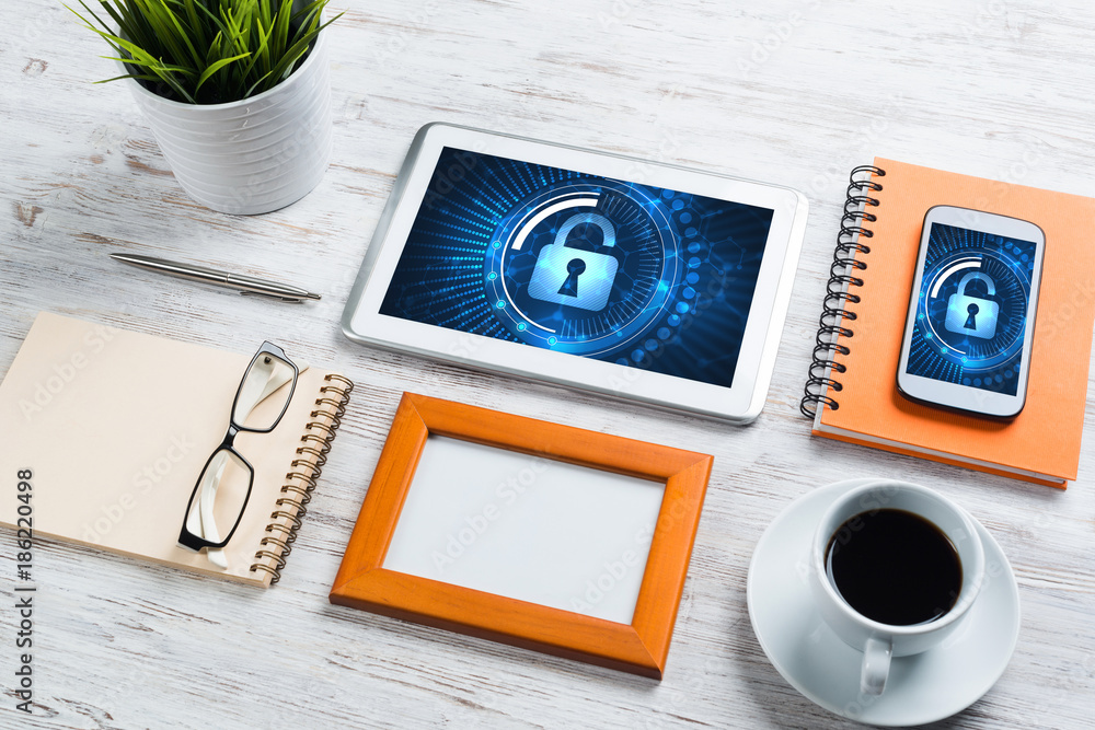 Web security and technology concept with tablet pc on wooden table Web security and technology concept with tablet pc on wooden table