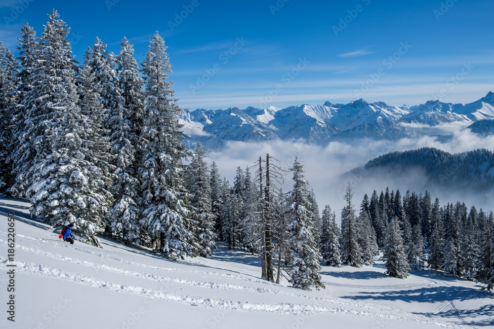Skitouring in the Allgaeu Alps near Oberstdorf on a beautiful bluebird day in winter Skitouring in the Allgaeu Alps near Oberstdorf on a beautiful bluebird day in winter