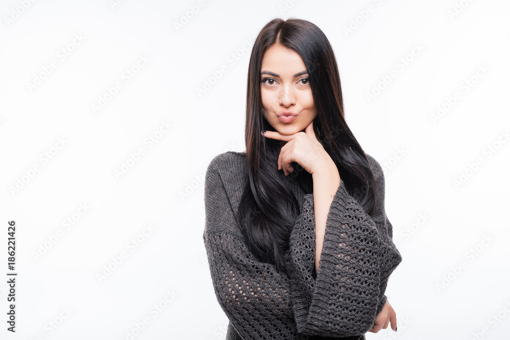 Young beautiful woman portrait isolated over white background. Young beautiful woman portrait isolated over white background.