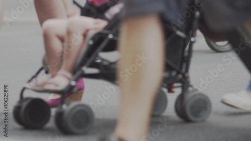 Slow Motion Shot Of A Crowd Of Pedestrians Crossing A Street In Berlin In Summer