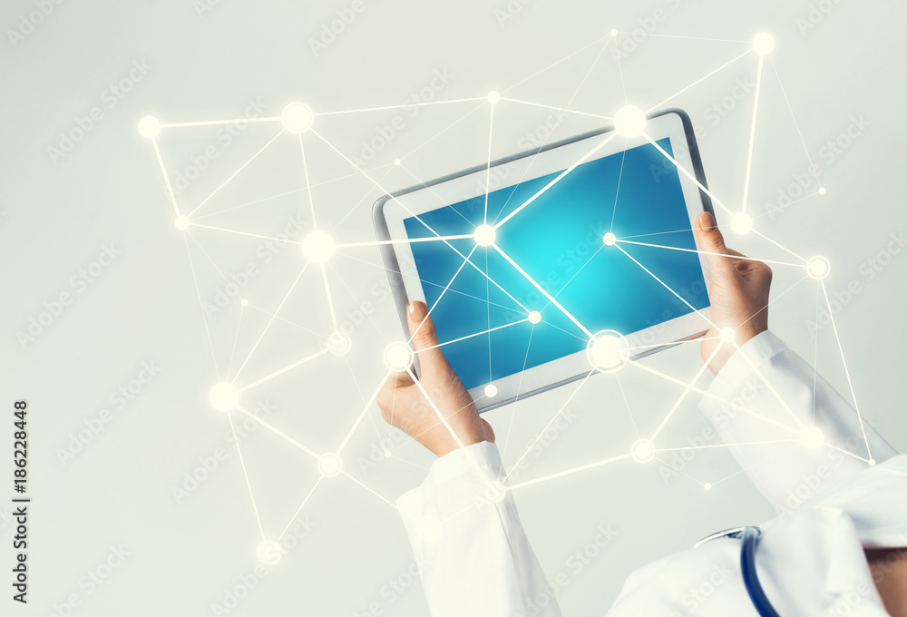 Close of female doctor hands working with tablet pc computer Close of female doctor hands working with tablet pc computer