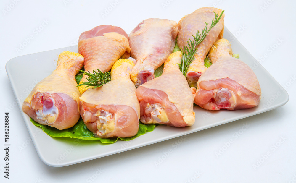 chicken thighs on white plate and white background chicken thighs on white plate and white background