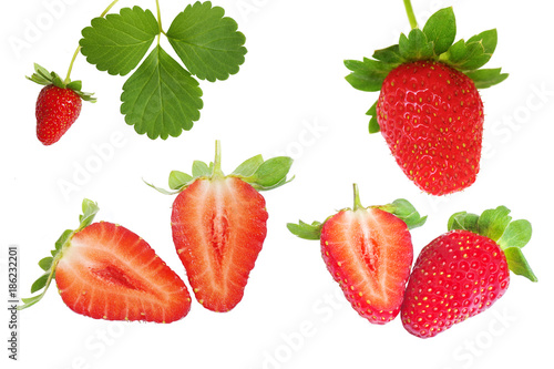 Set of fresh organic strawberry with leaf and cut in half isolated on white background.