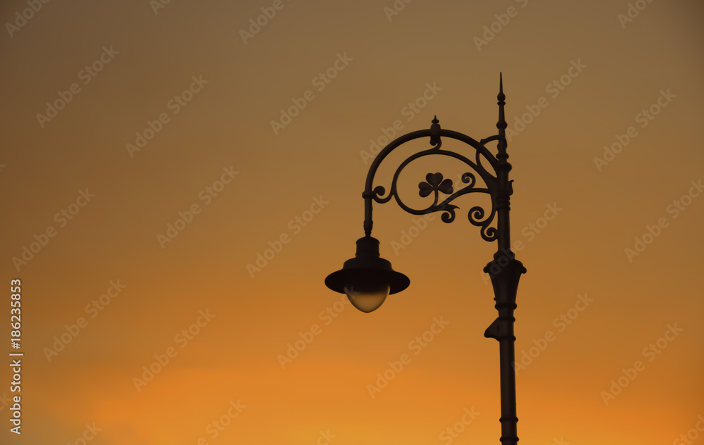 street lights during beautiful sunset street lights during beautiful sunset