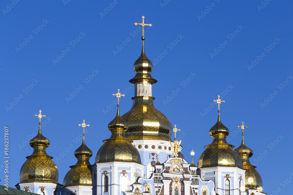 Gilding the dome of the Orthodox cathedral against the blue sky