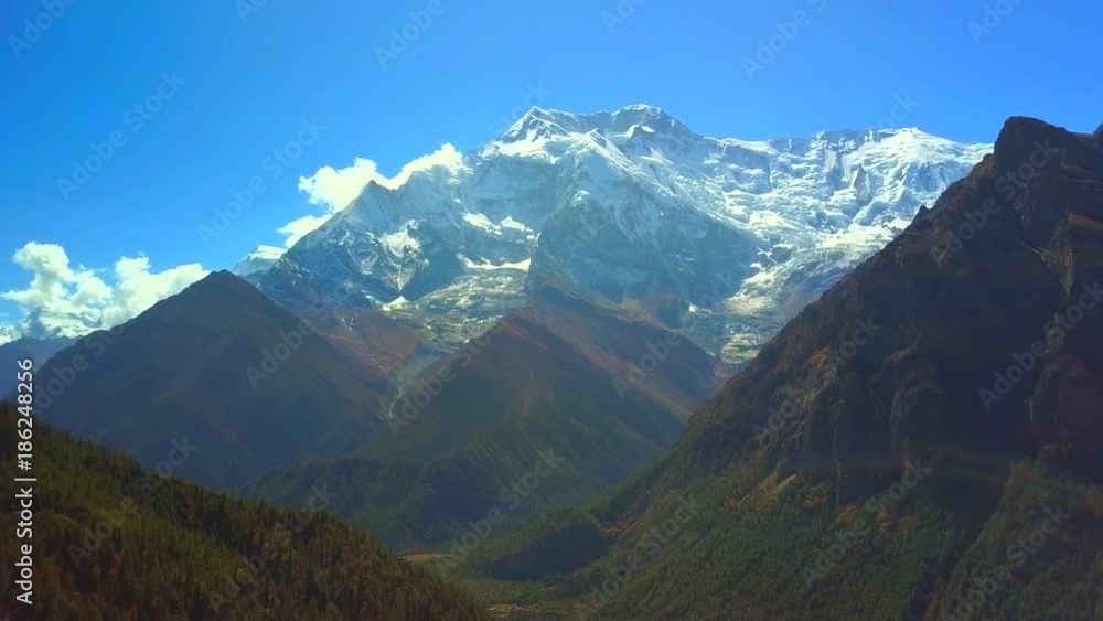 Sunrise above peak in the Himalaya range, Nepal Sunrise above peak in the Himalaya range, Nepal