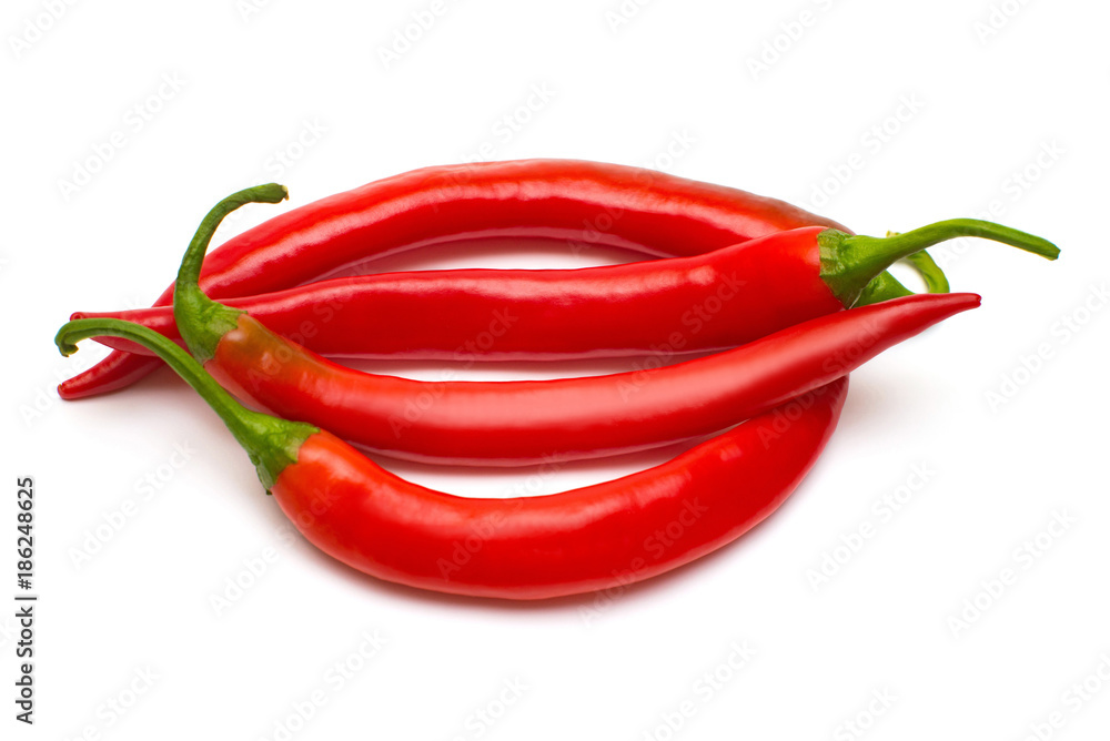 Red chili peppers isolated on white background. Creative spicy sharp. Flat lay, top view Red chili peppers isolated on white background. Creative spicy sharp. Flat lay, top view