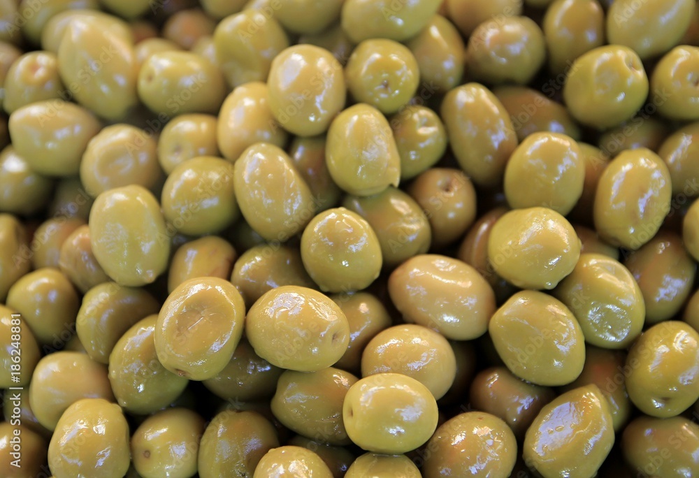 fresh green olives in a bowl stock photo fresh green olives in a bowl stock photo