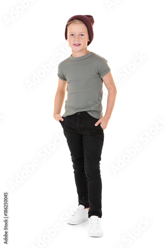 Cute fashionable boy on whi...