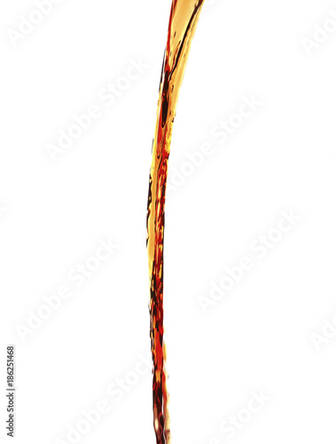 Stream of cola on white background