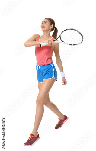 Young woman with tennis racket on white background © Africa Studio