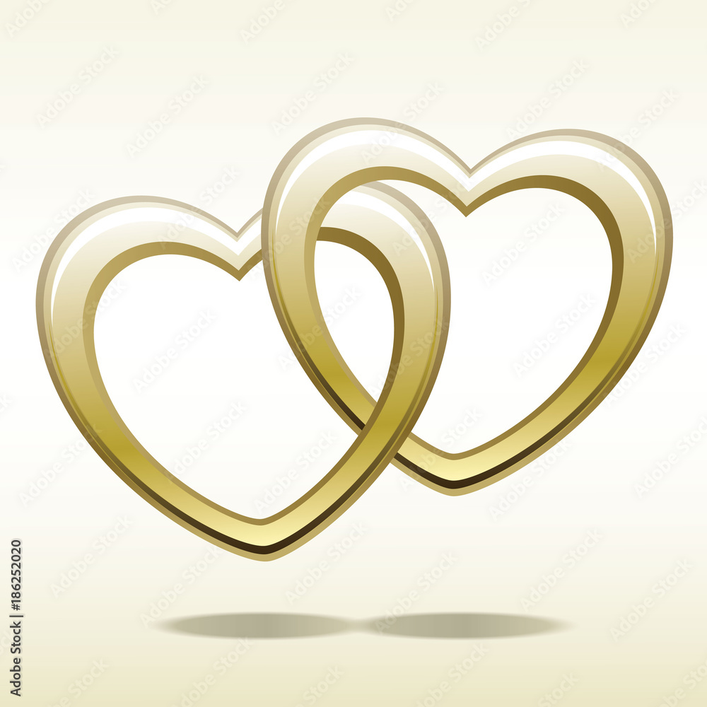 Valentines Day. Gold heart shaped rings attached to each other. Valentines Day. Gold heart shaped rings attached to each other.