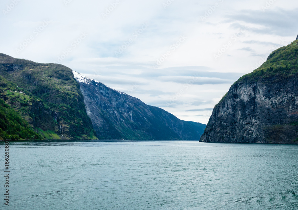 Narrowing cliffs and slopes in Sognefjord, Norway.