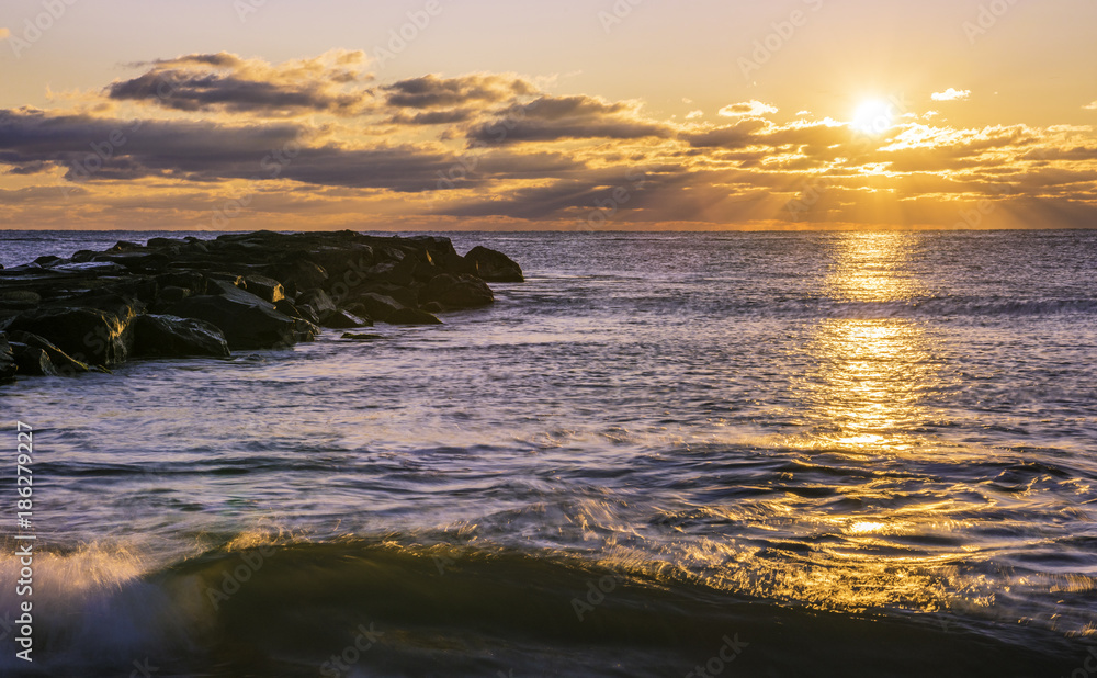 Fascinating light during sunrise at Belmar Beach, New Jersey 
