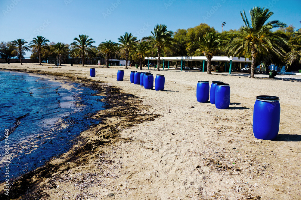 Oil spill cleanup. Greek oil spill spreads to Athens Riviera following the sinking of an oil tanker in Saronic Gulf, Athens, Greece, September 14 2017.