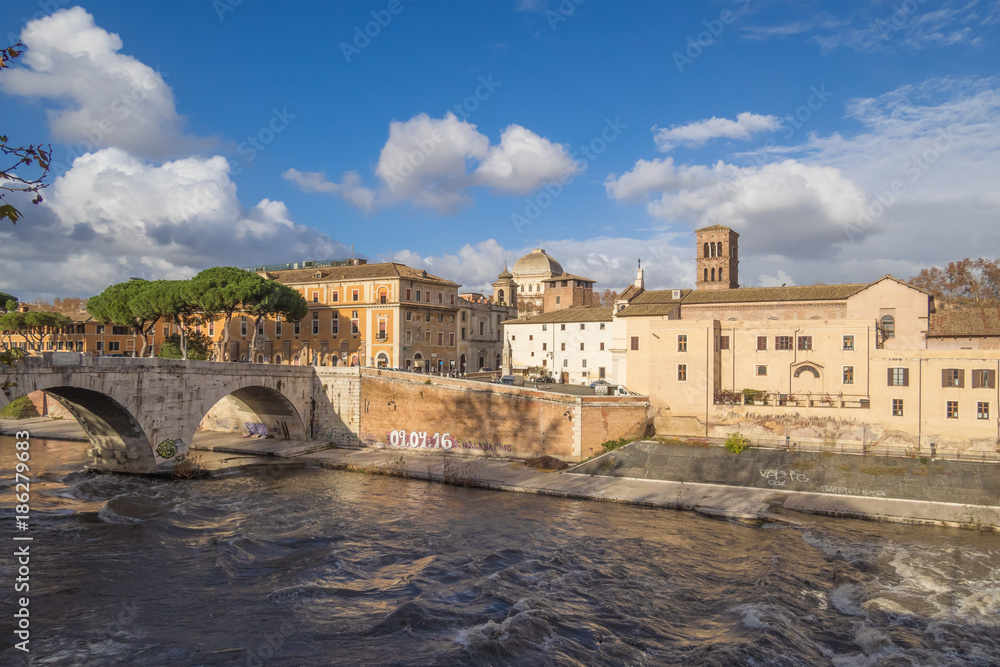Rome (Italy) - The Tiber river and the monumental Lungotevere with 'Isola Tiberina' island, jewish district and 'Teatro Marcello' ruins