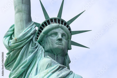 Close up of The Statue of Liberty on Liberty Island in New York City. This is the copper statue which is a gift from the people of France to the people of the United States.  © apinpornb