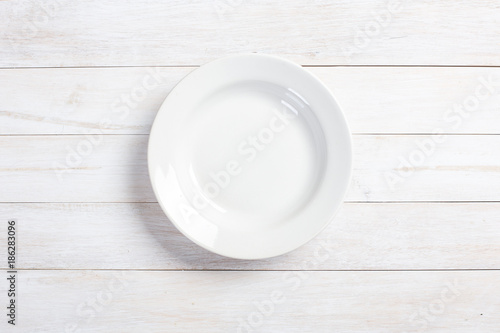  plate on white wooden table