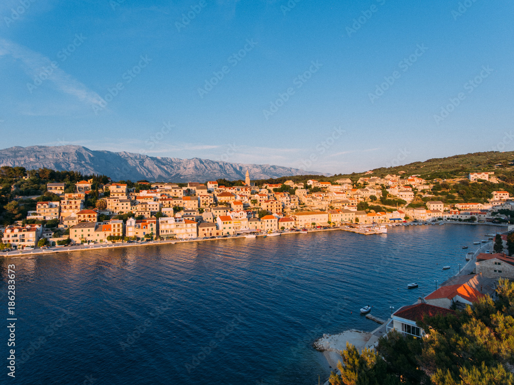 Aerial - High ange view of village. Small Adriatic town