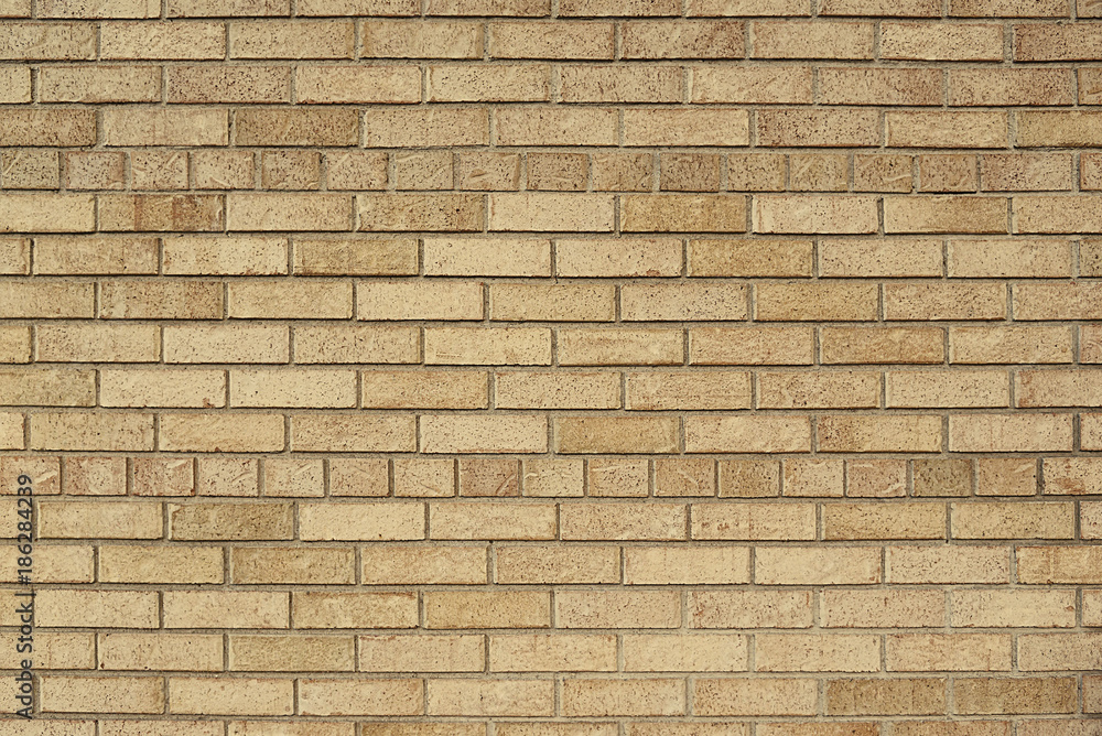 Old beige brick wall background texture Old beige brick wall background texture