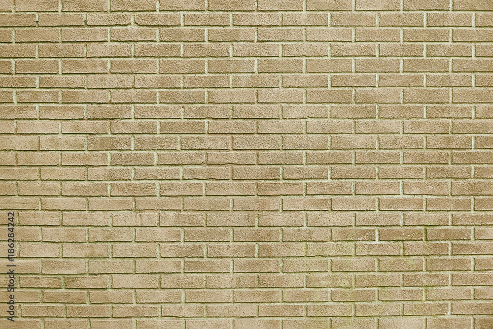 Old beige brick wall background texture Old beige brick wall background texture