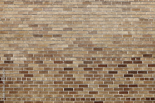 Old brown brick wall background texture