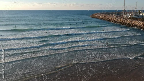 Aerial Shot of surfers in Herzliya photo