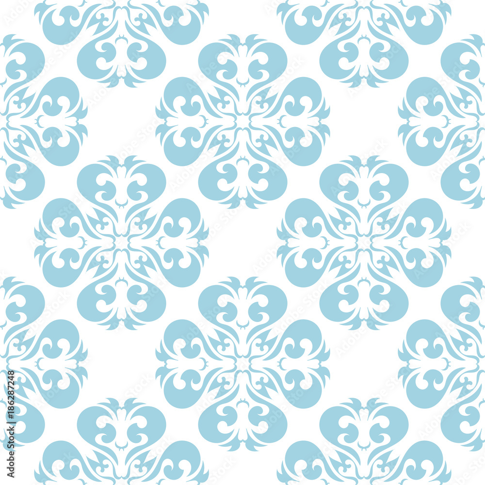 Blue flowers on white background. Ornamental seamless pattern