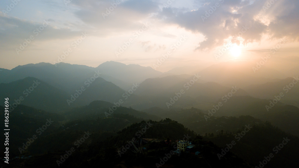 Sunrise above peak in the Himalaya range, Nepal