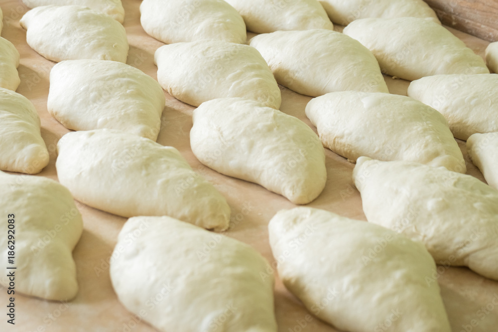 Fresh dough on the wooden board, pizza, Georgian bread Fresh dough on the wooden board, pizza, Georgian bread