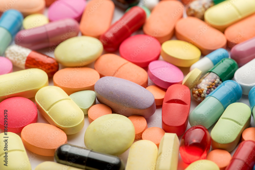 Pharmacy theme. Multicolored Isolated Pills and Capsules Pharmacy theme. Multicolored Isolated Pills and Capsules