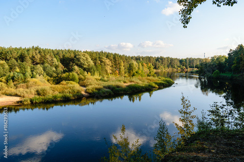 high water level in river Gauja  near Valmiera city in Latvia. summer trees surrounding