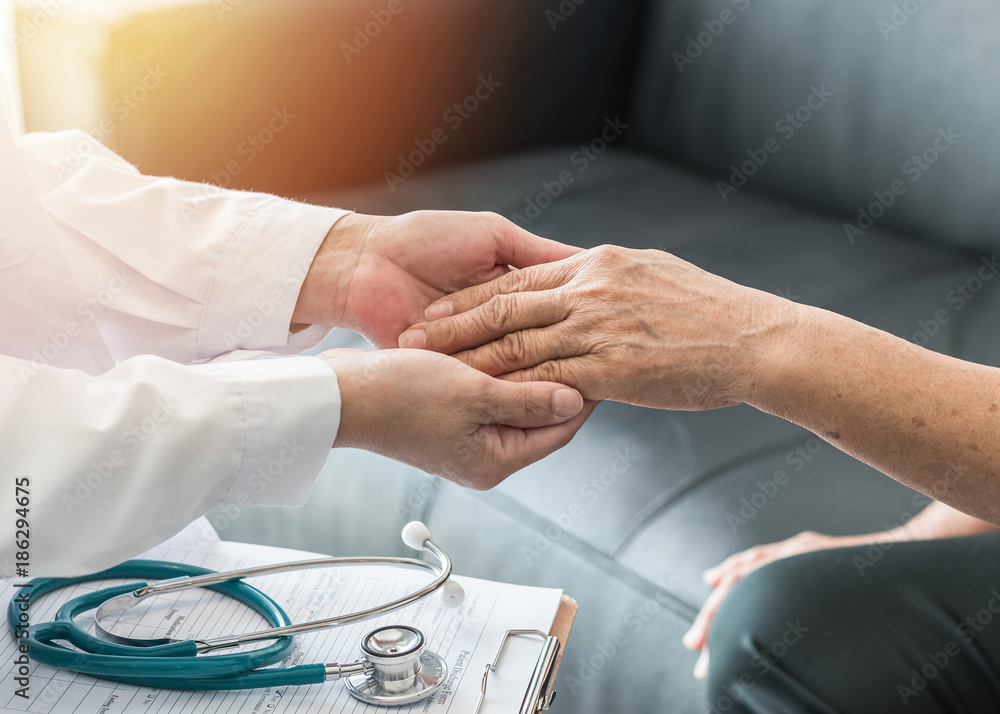 Obraz premium Geriatric doctor (geriatrician) consulting and diagnostic examining elderly senior adult patient (older person) on aging and mental health care in medical clinic office or hospital examination room