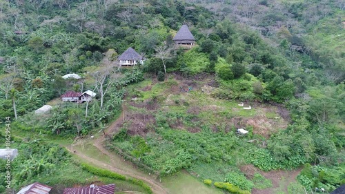 Traditional village Wae Rebo on Flores island in Indonesia. aerial view drone 4k. photo