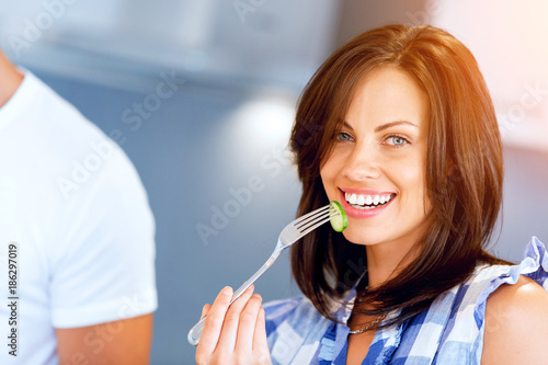 Young woman with a fork