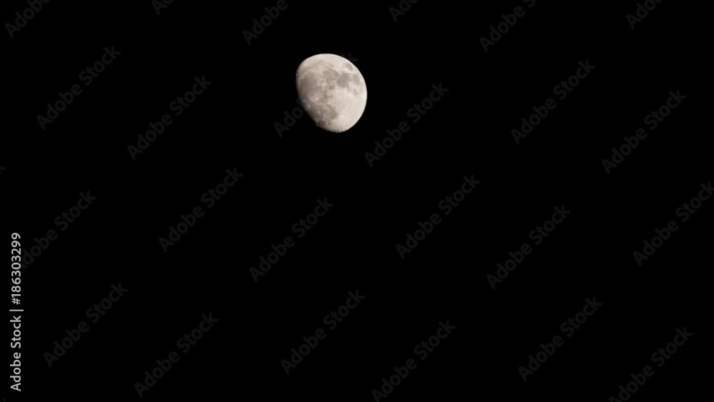 Moon time lapse moving across night sky. 4K Moon time lapse moving across night sky. 4K